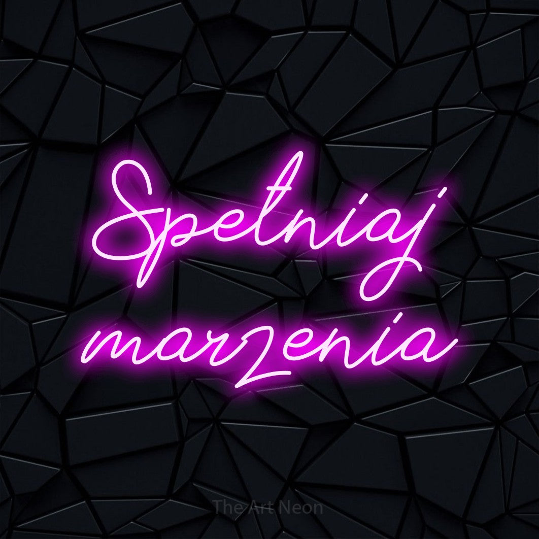 LED neon sign reading “Spełniaj marzenia”, arranged in two lines.