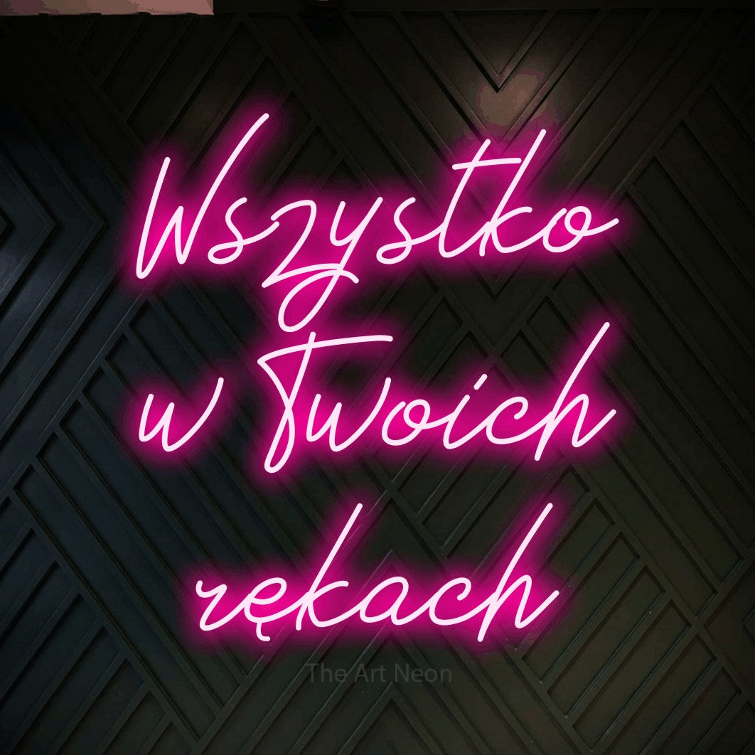 LED neon sign reading “Wszystko w Twoich rękach”, arranged in three lines.