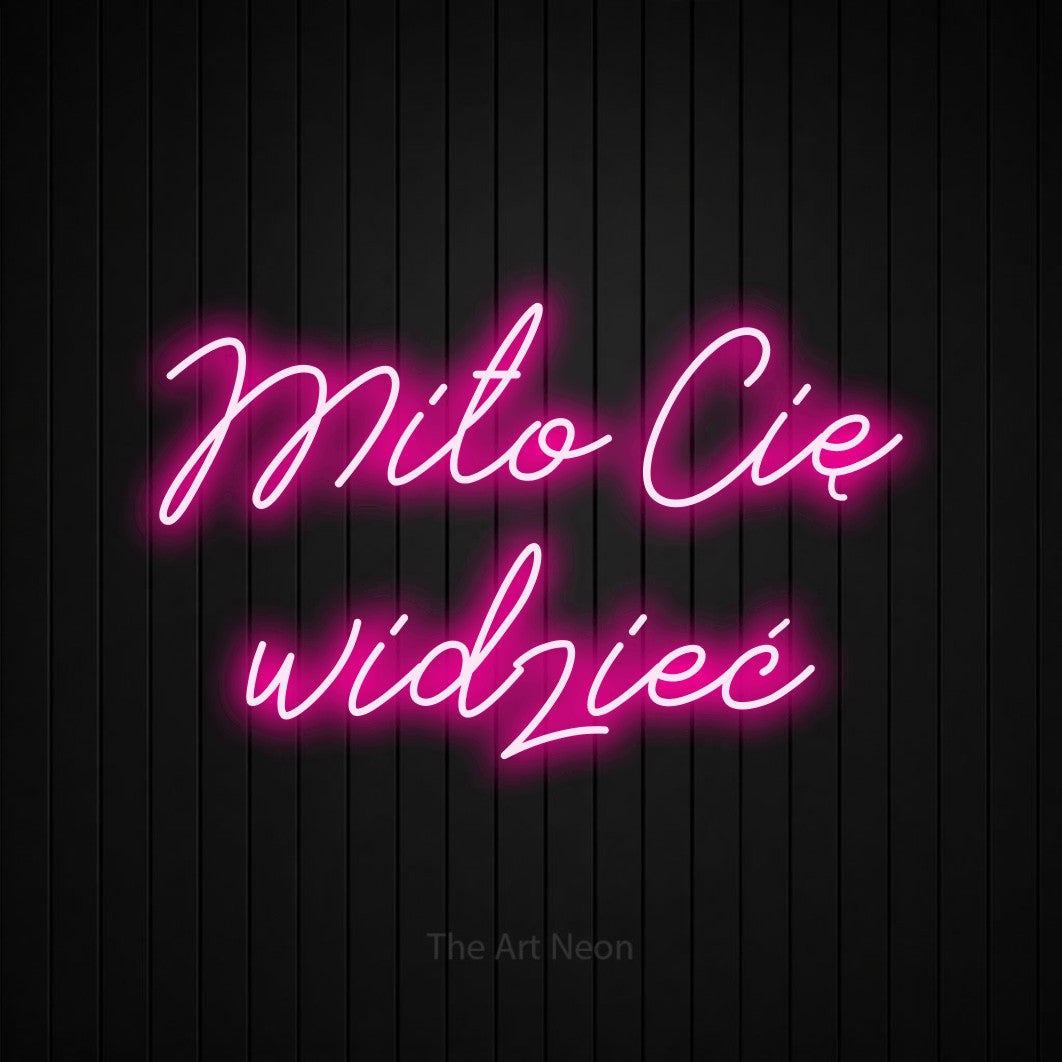 LED neon sign reading “Miło Cię widzieć”, arranged in two lines.