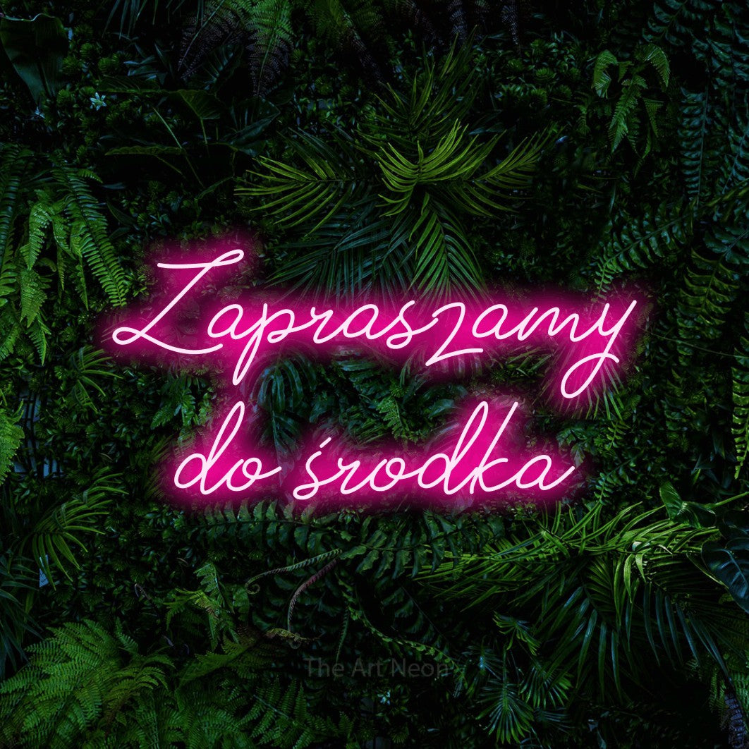 LED neon sign reading “Zapraszamy do środka”, arranged in two lines.