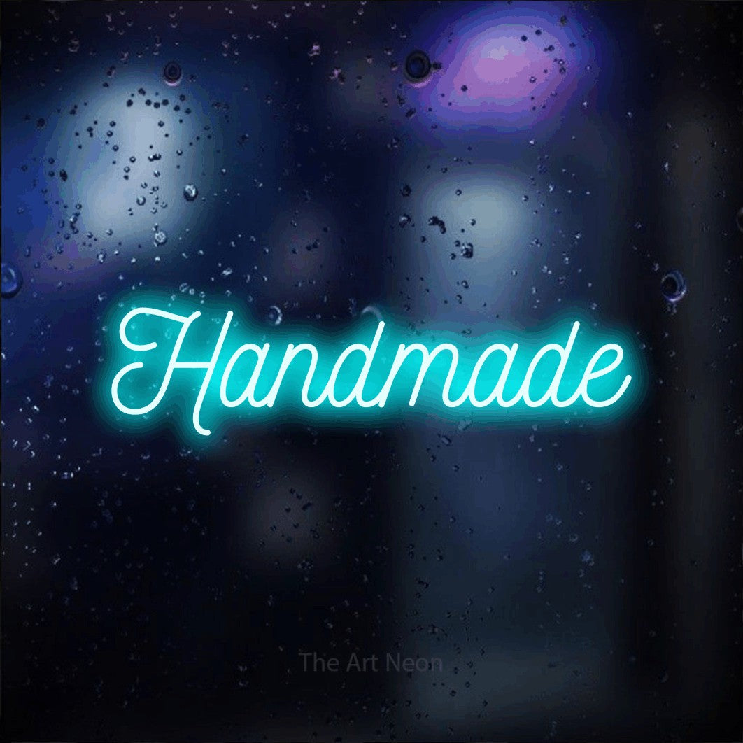LED neon sign reading “Handmade”, arranged in a single line.