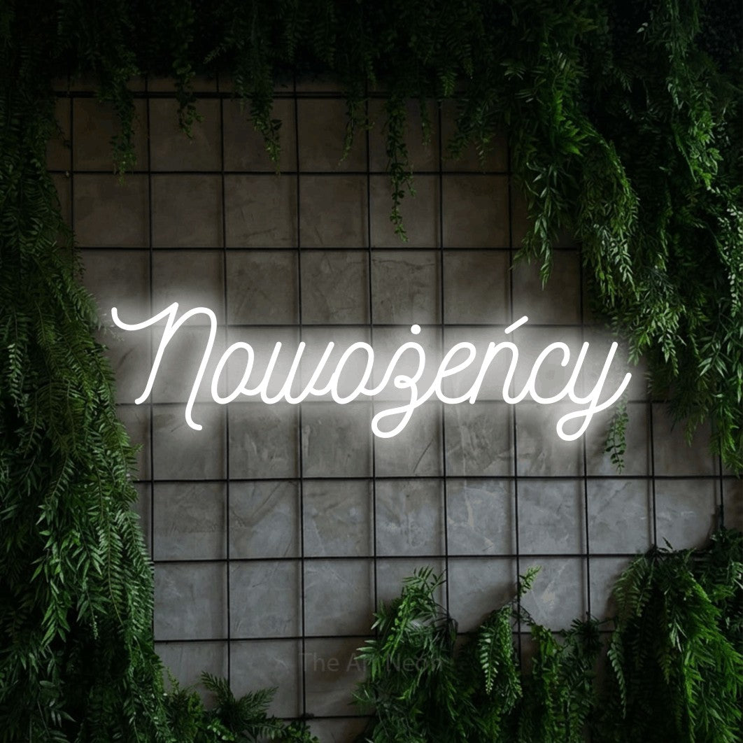LED neon sign reading “Nowożeńcy”, arranged in a single line.
