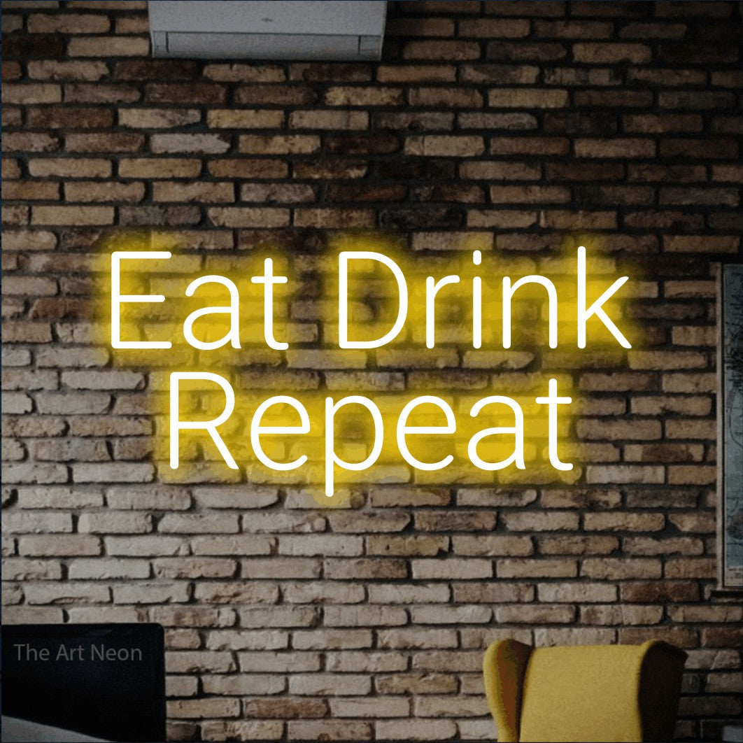 LED neon sign reading “Eat Drink Repeat”, arranged in two lines.