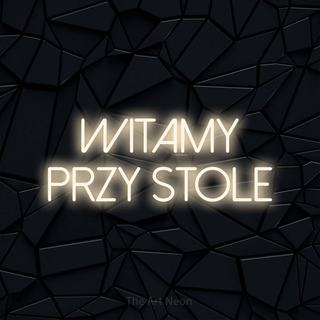 LED neon sign reading “witamy przy stole”, arranged in two lines.