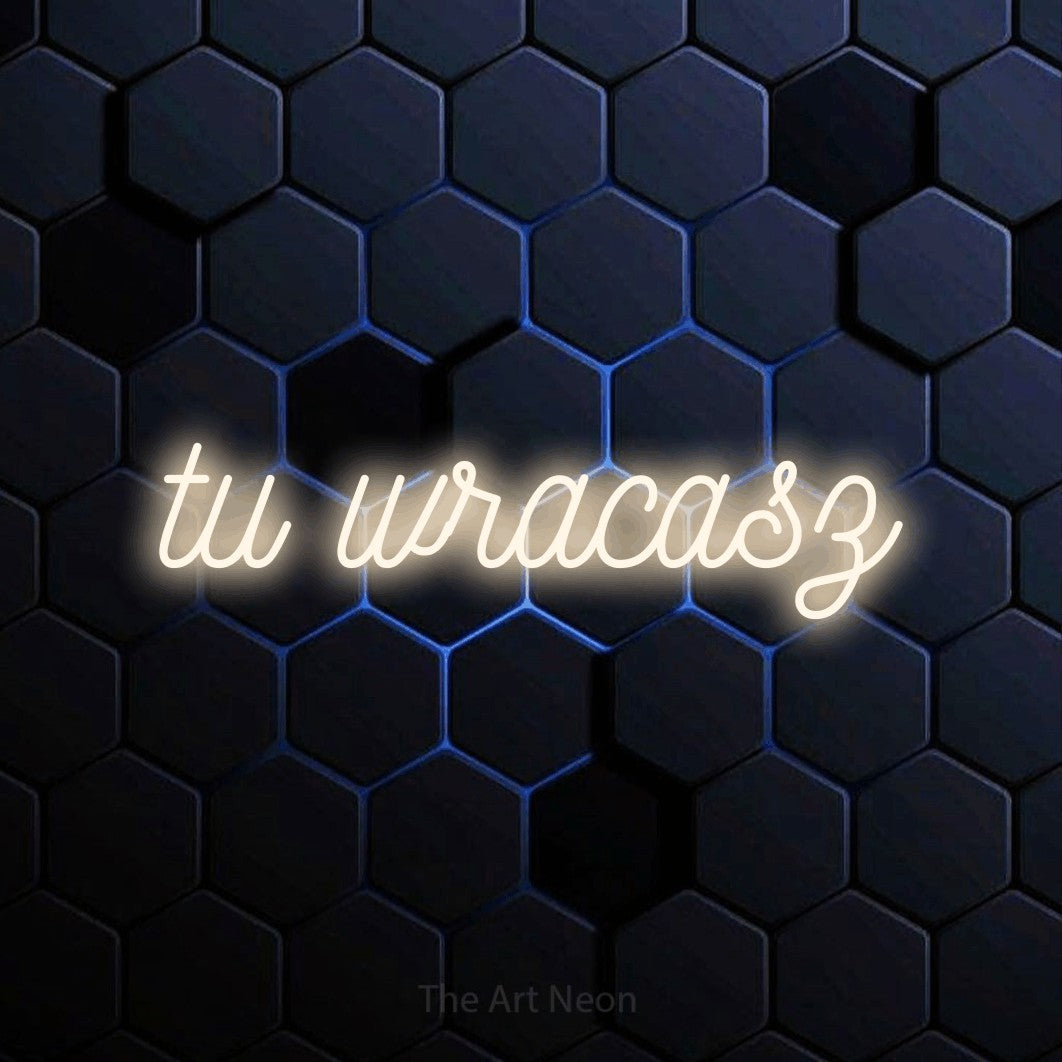 LED neon sign reading “tu wracasz”, arranged in a single line.