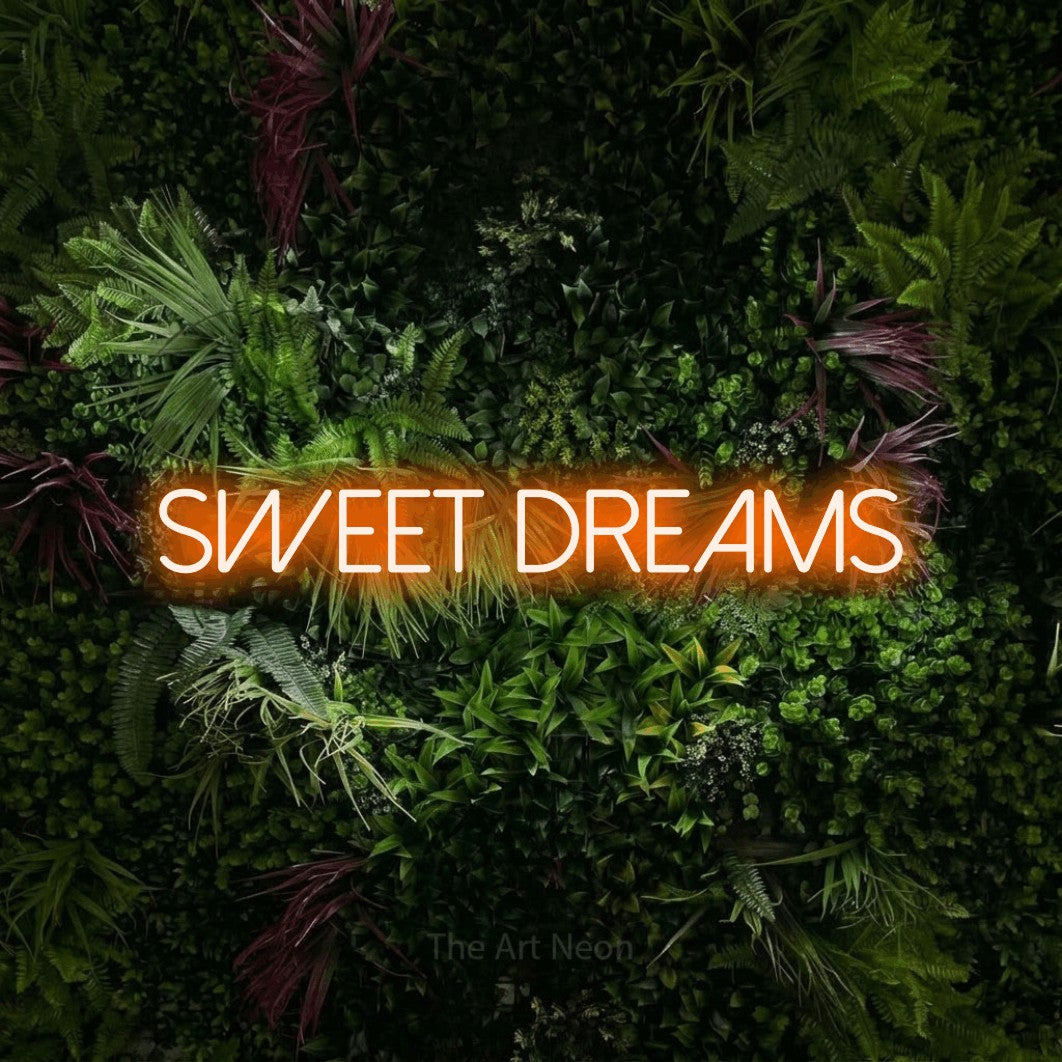 LED neon sign reading “SWEET DREAMS”, arranged in a single line.
