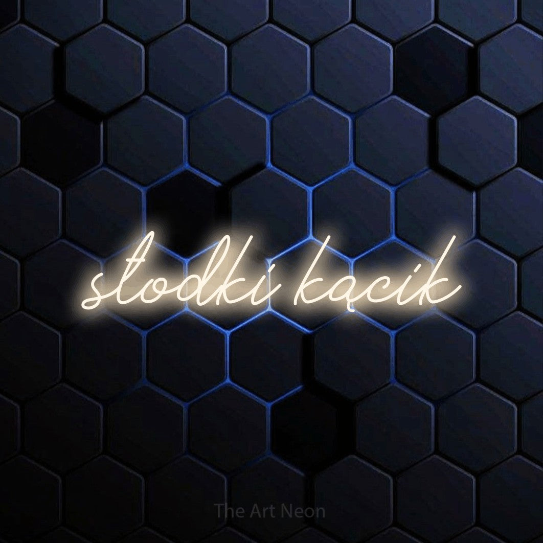 LED neon sign reading “słodki kącik”, arranged in a single line.