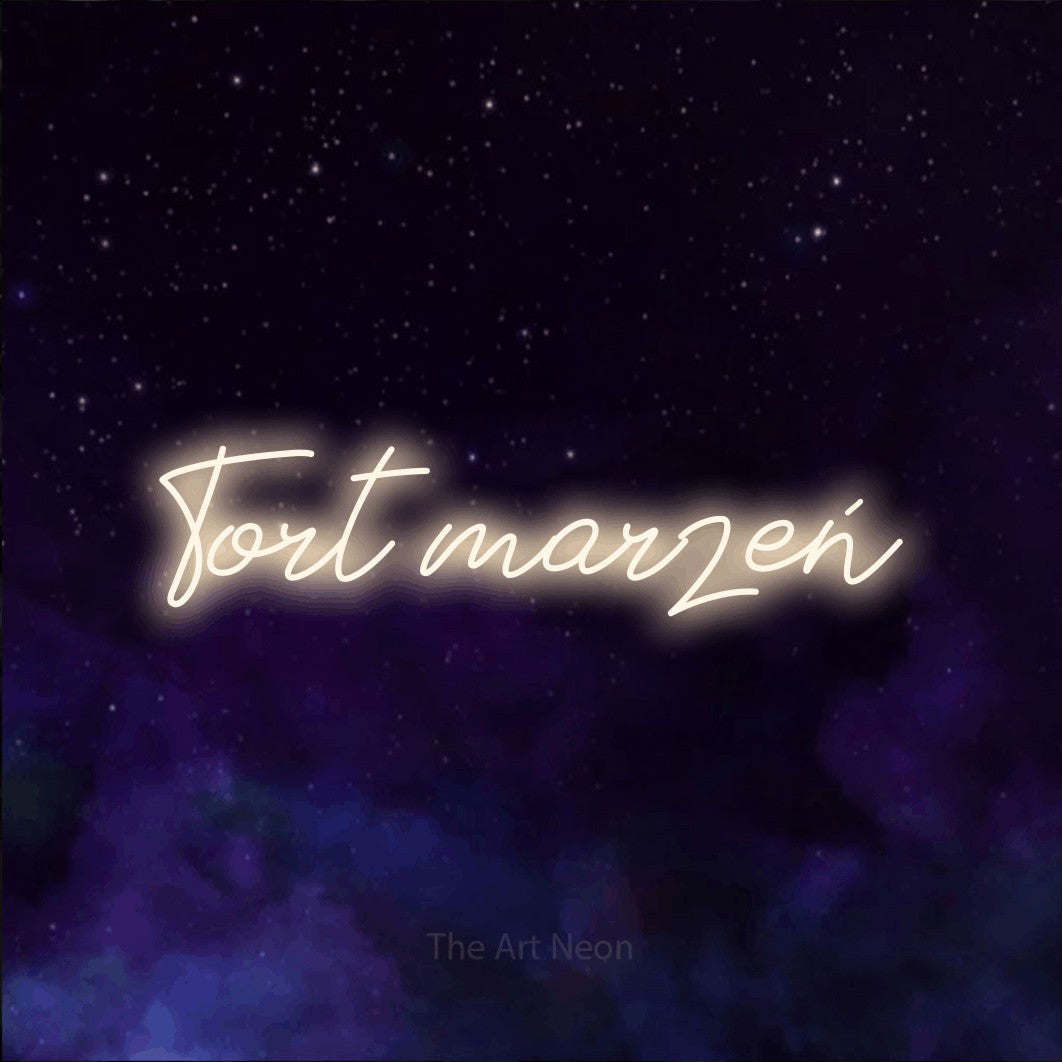 LED neon sign reading “Tort marzeń”, arranged in a single line.
