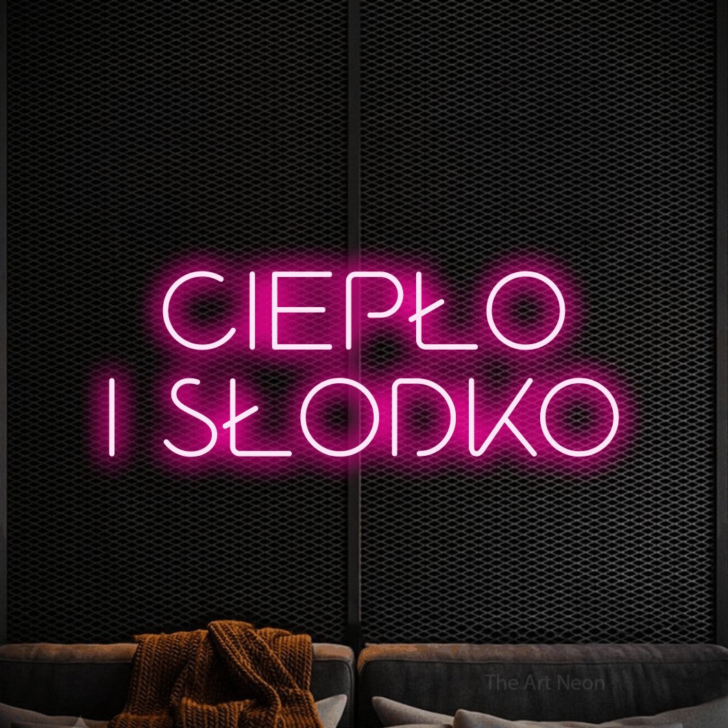 LED neon sign reading “CIEPŁO I SŁODKO”, arranged in two lines.