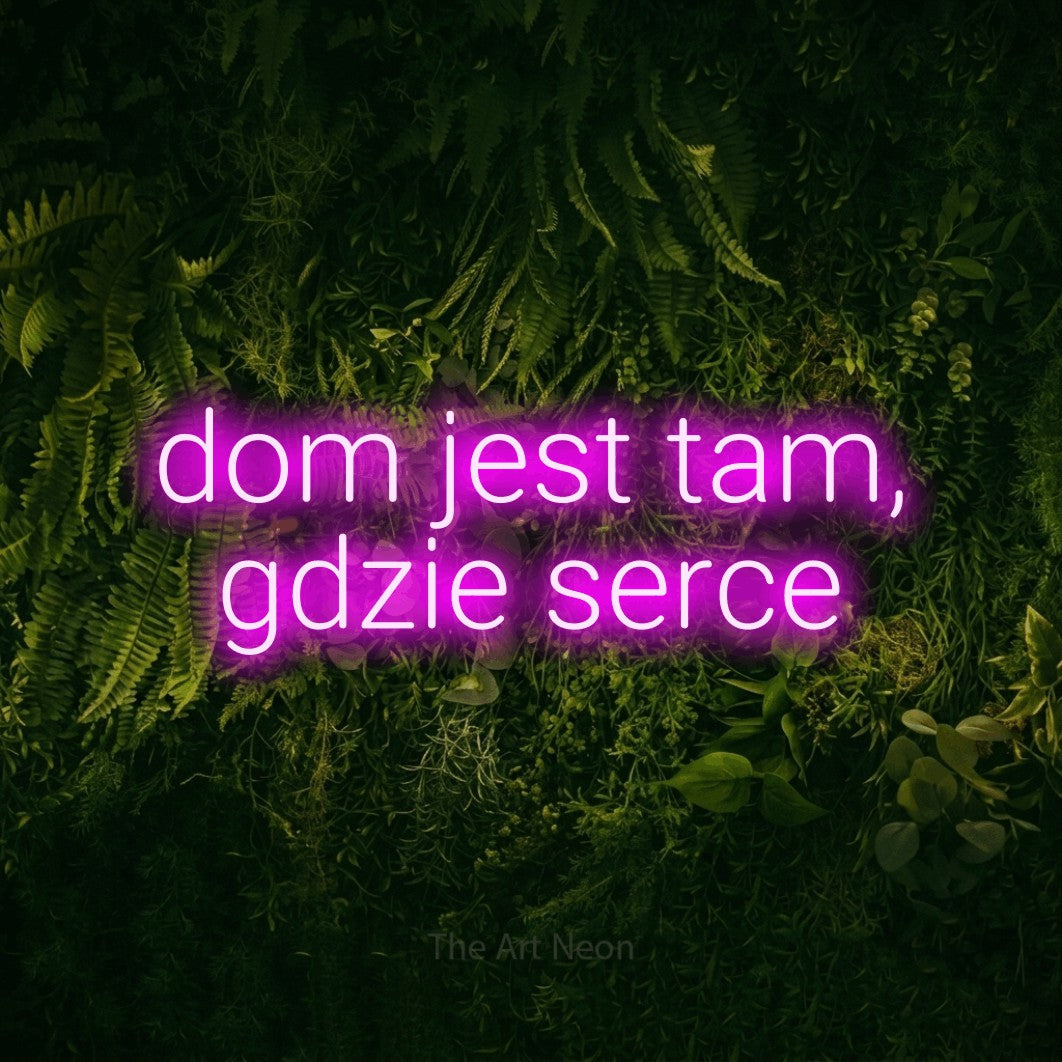 LED neon sign reading “dom jest tam, gdzie serce”, arranged in two lines.