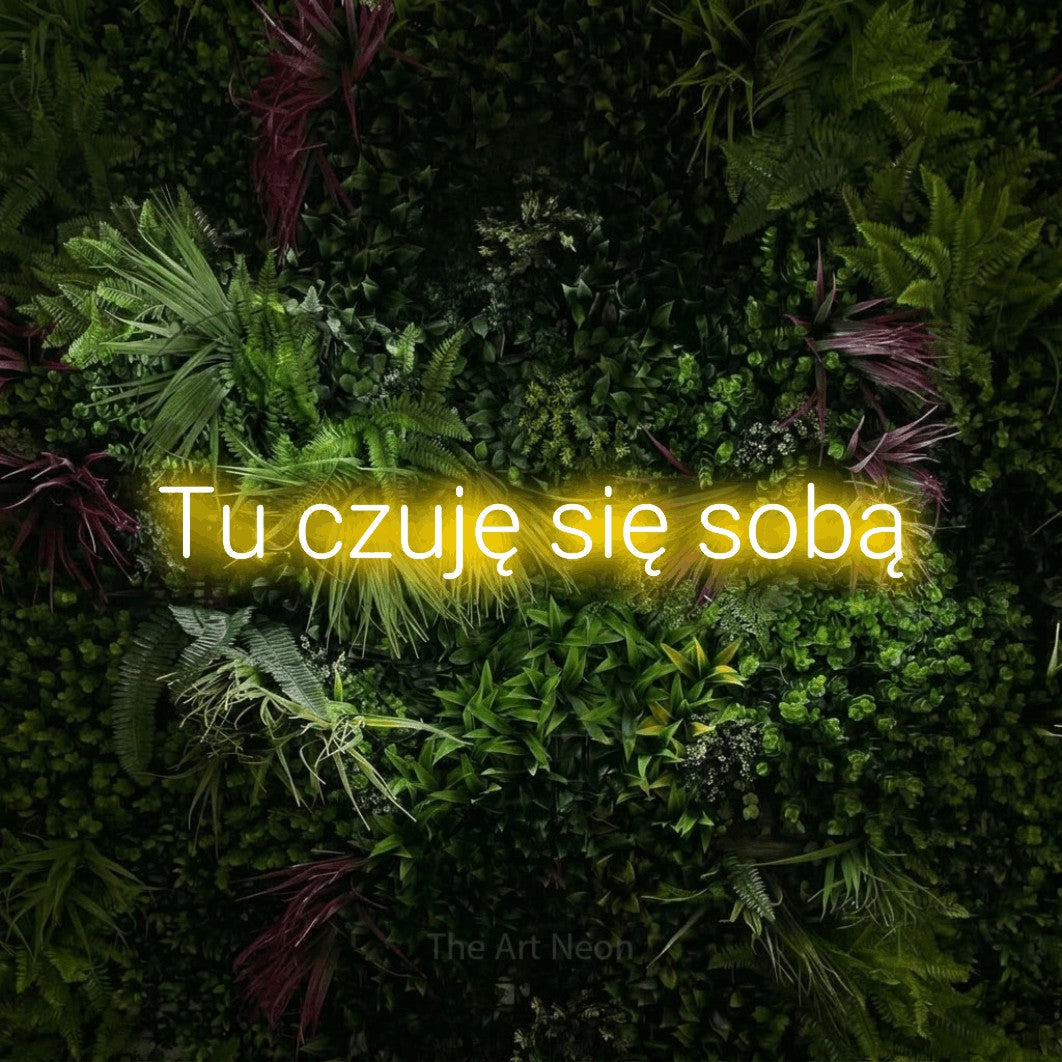 LED neon sign reading “Tu czuję się sobą”, arranged in a single line.