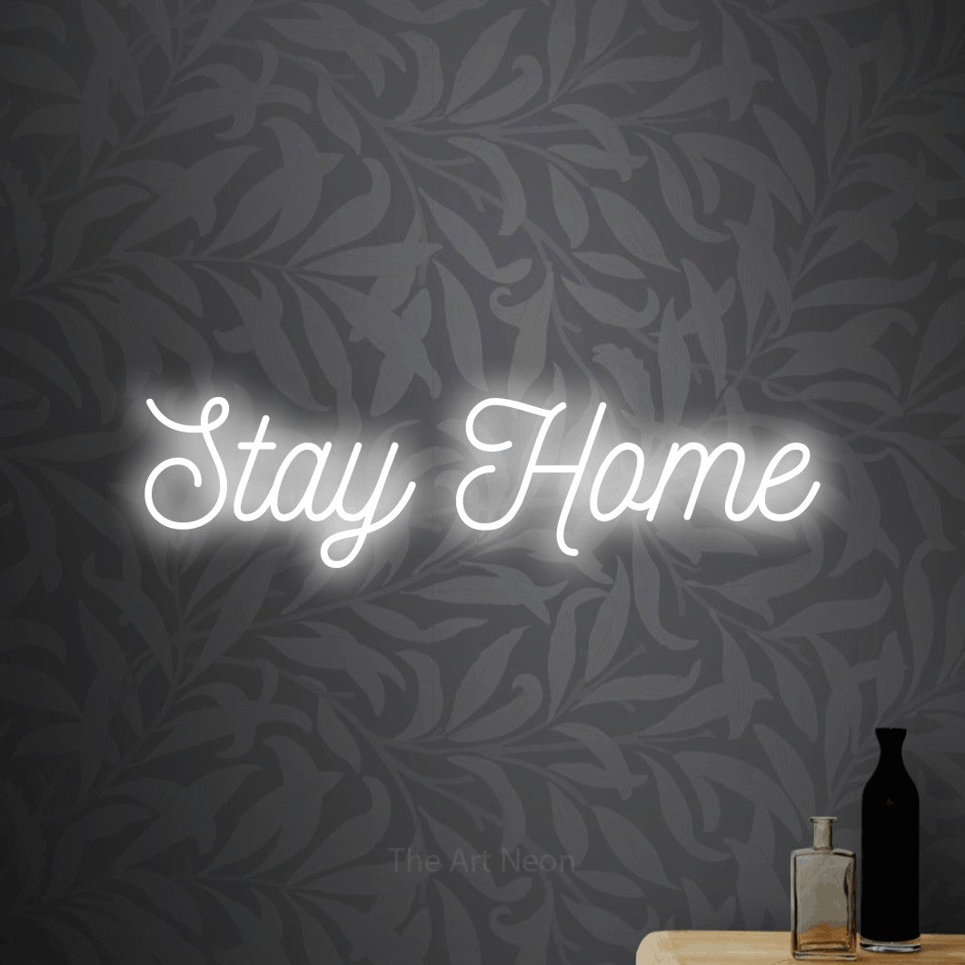 LED neon sign reading “Stay Home”, arranged in a single line.