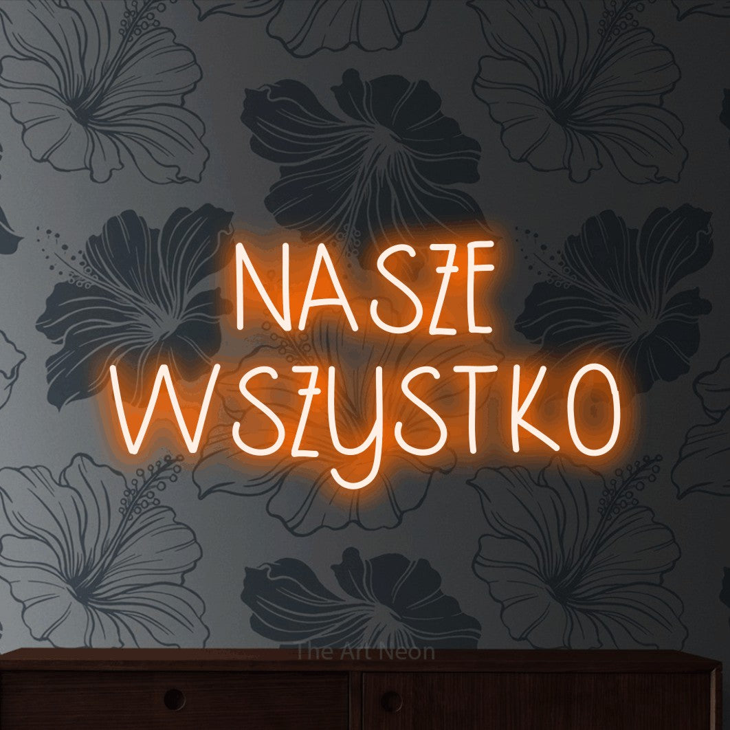 LED neon sign reading “NASZE WSZYSTKO”, arranged in two lines.