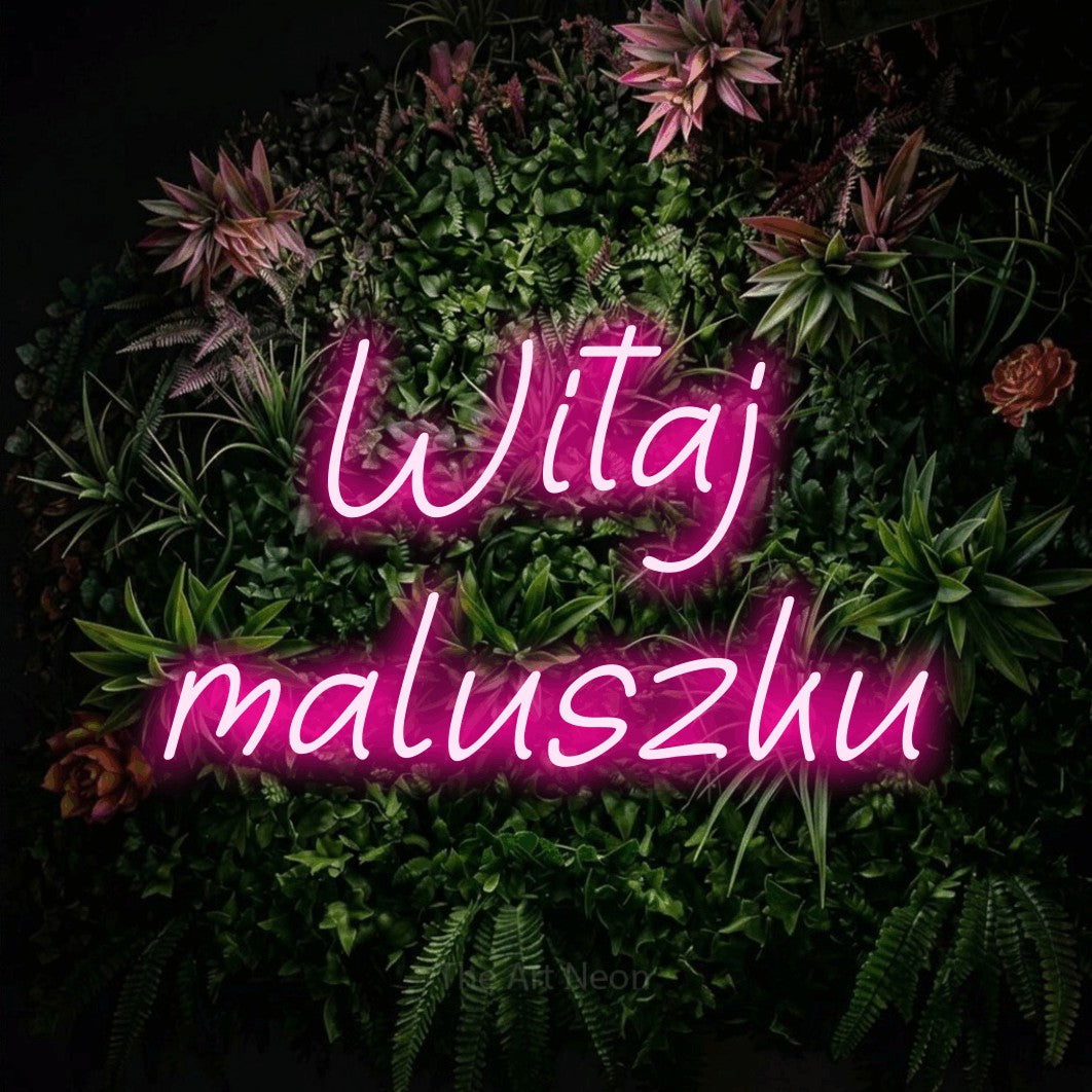 LED neon sign reading “Witaj maluszku”, arranged in two lines.