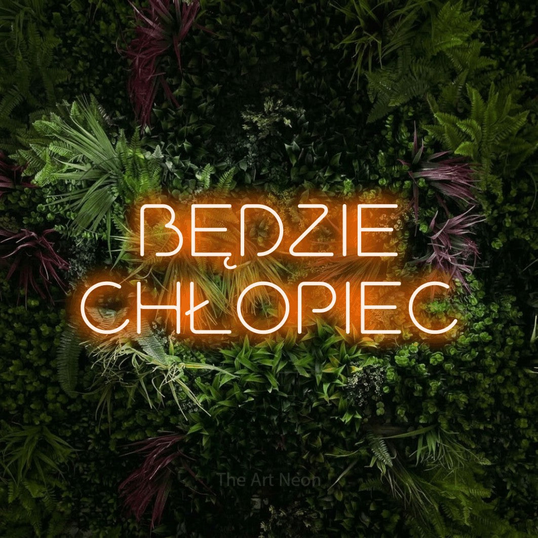 LED neon sign reading “BĘDZIE CHŁOPIEC”, arranged in two lines.