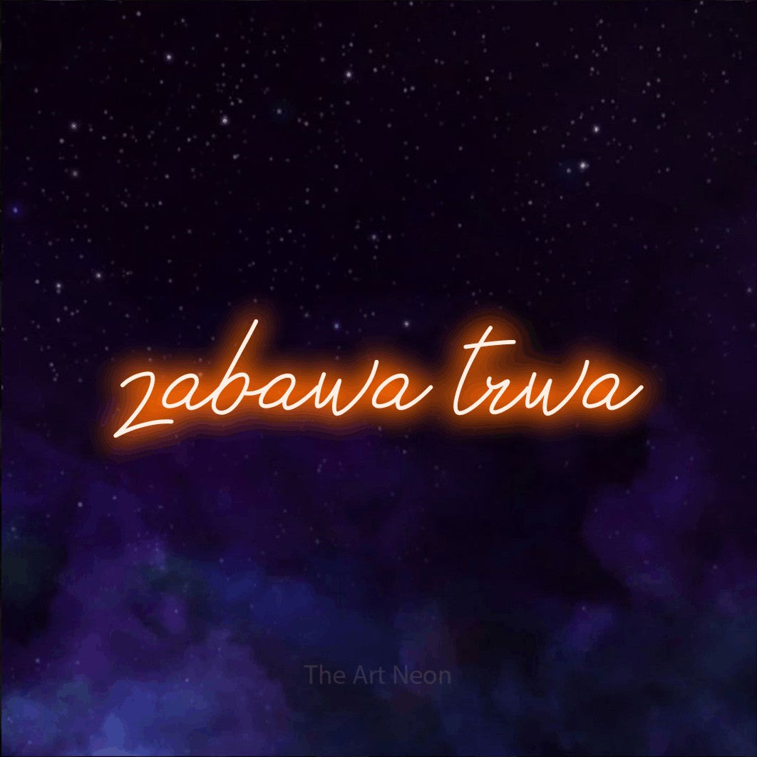 LED neon sign reading “zabawa trwa”, arranged in a single line.