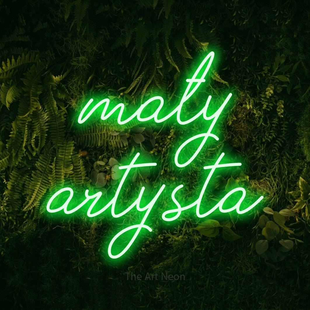 LED neon sign reading “mały artysta”, arranged in two lines.