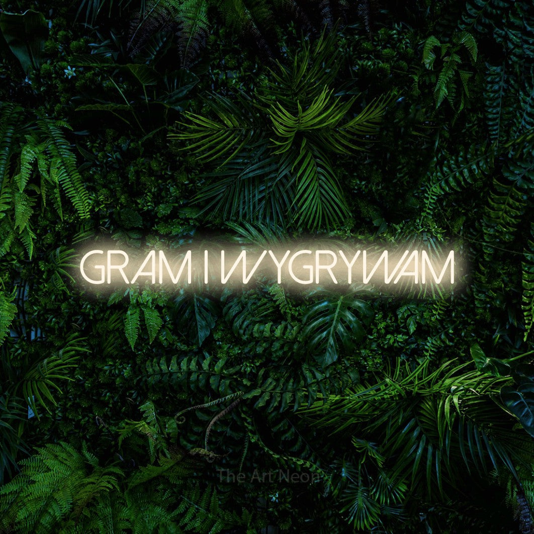 LED neon sign reading “gram i wygrywam”, arranged in a single line.