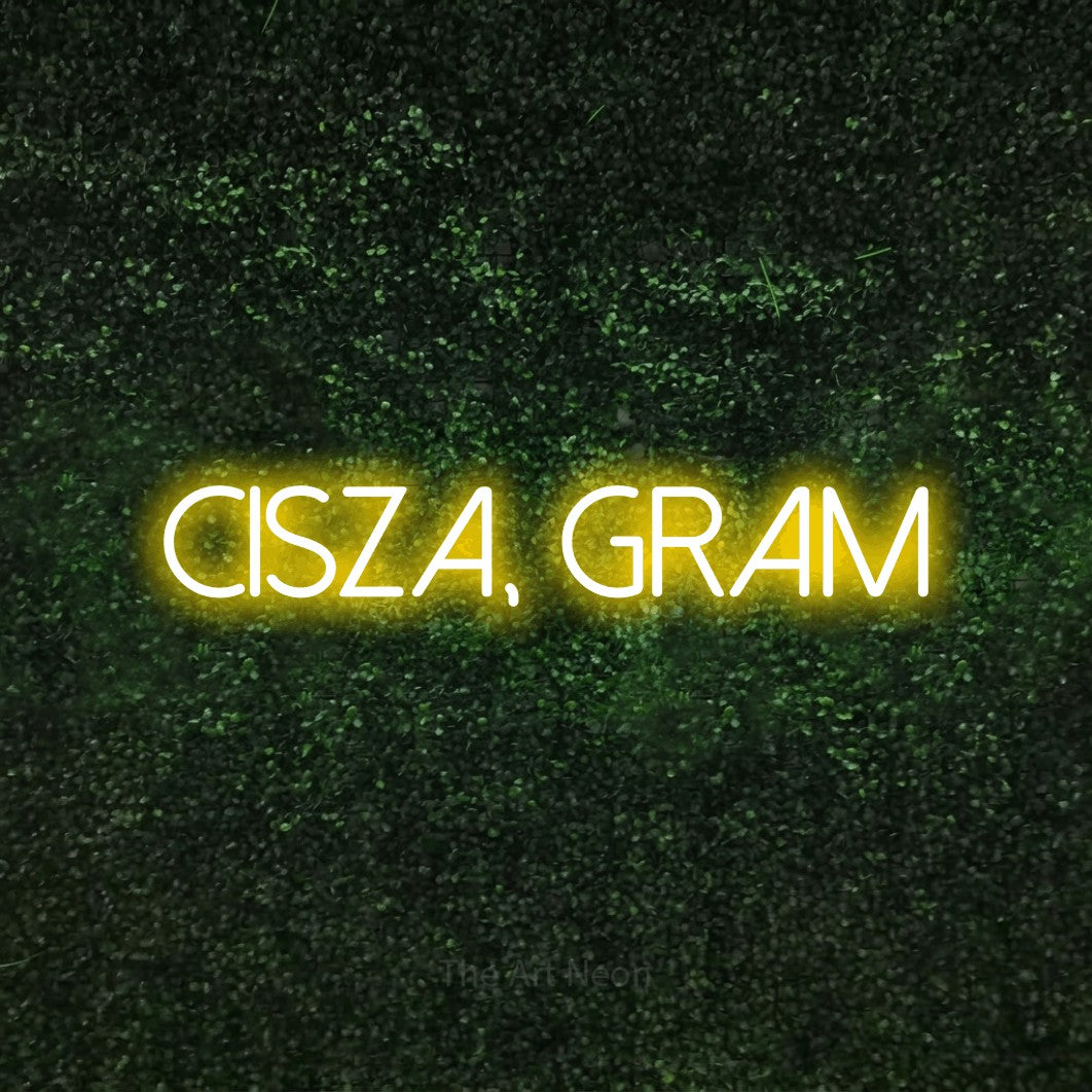 LED neon sign reading “CISZA, GRAM”, arranged in a single line.