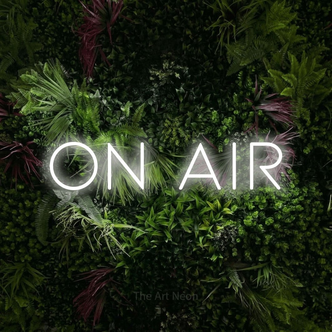 LED neon sign reading “ON AIR”, arranged in a single line.