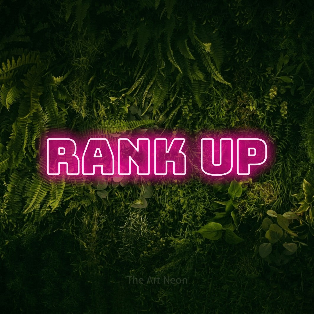 LED neon sign reading “RANK up”, arranged in a single line.