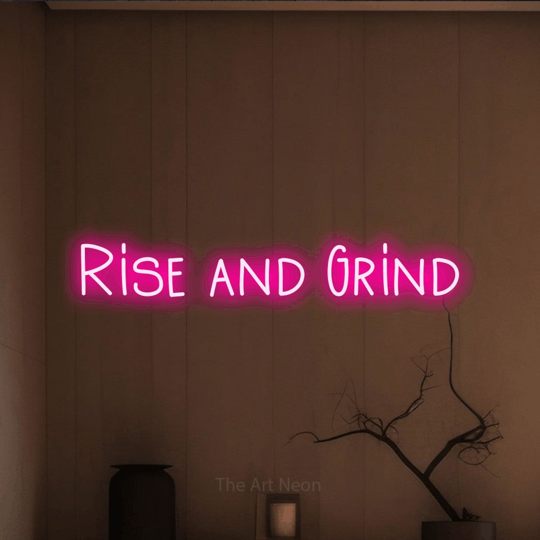 LED neon sign reading “Rise and Grind”, arranged in a single line.