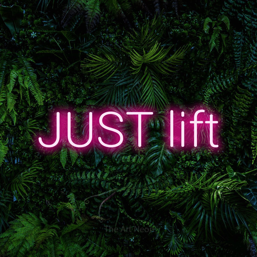 LED neon sign reading “JUST lift”, arranged in a single line.