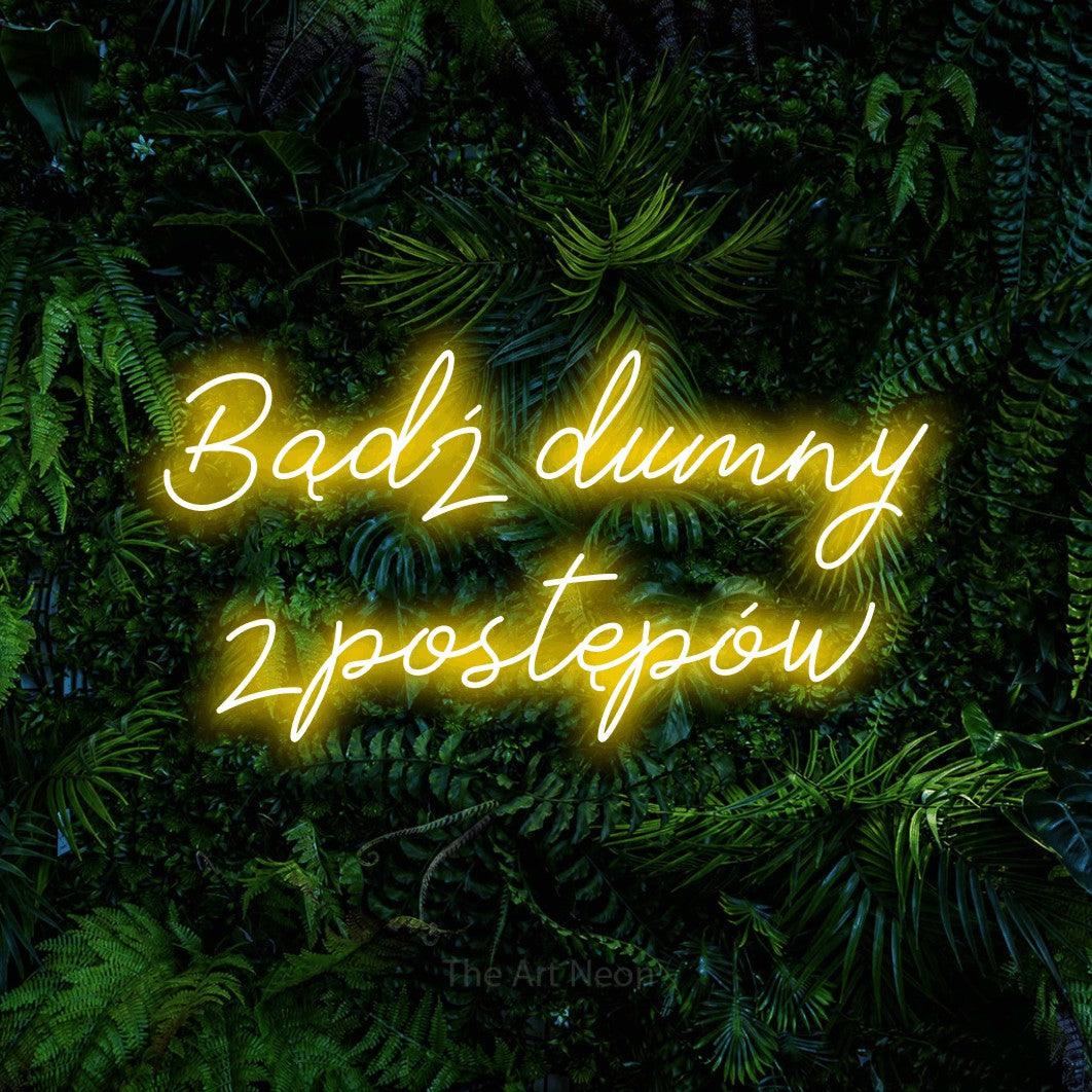 LED neon sign reading “Bądź dumny z postępów”, arranged in two lines.
