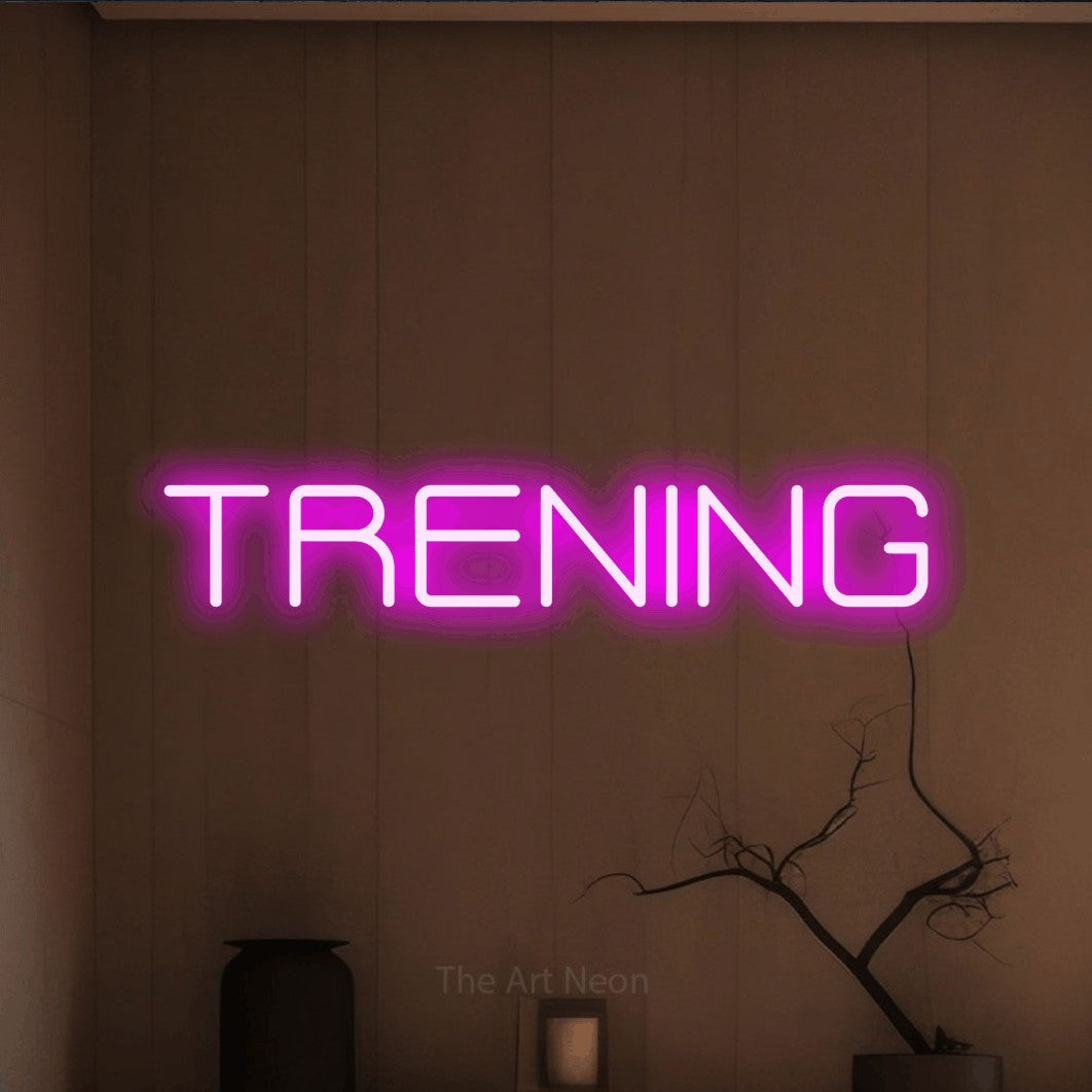 LED neon sign reading “TRENING”, arranged in a single line.