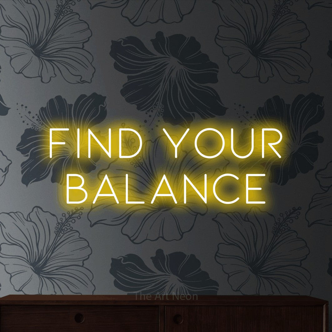 LED neon sign reading “FIND YOUR BALANCE”, arranged in two lines.