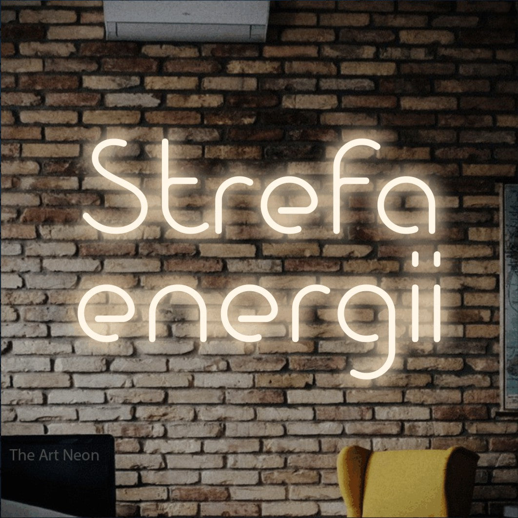 LED neon sign reading “Strefa energii”, arranged in two lines.