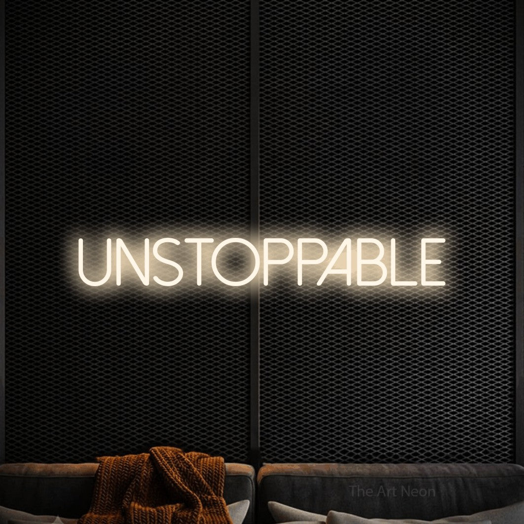 LED neon sign reading “UNSTOPPABLE”, arranged in a single line.