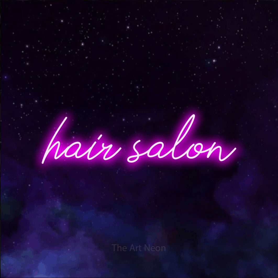 LED neon sign reading “hair salon”, arranged in a single line.