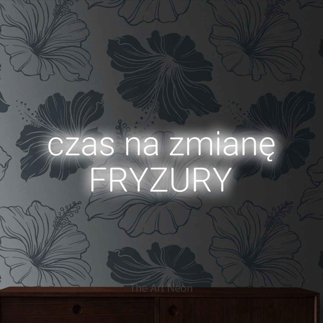 LED neon sign reading “czas na zmianę FRYZURY”, arranged in two lines.