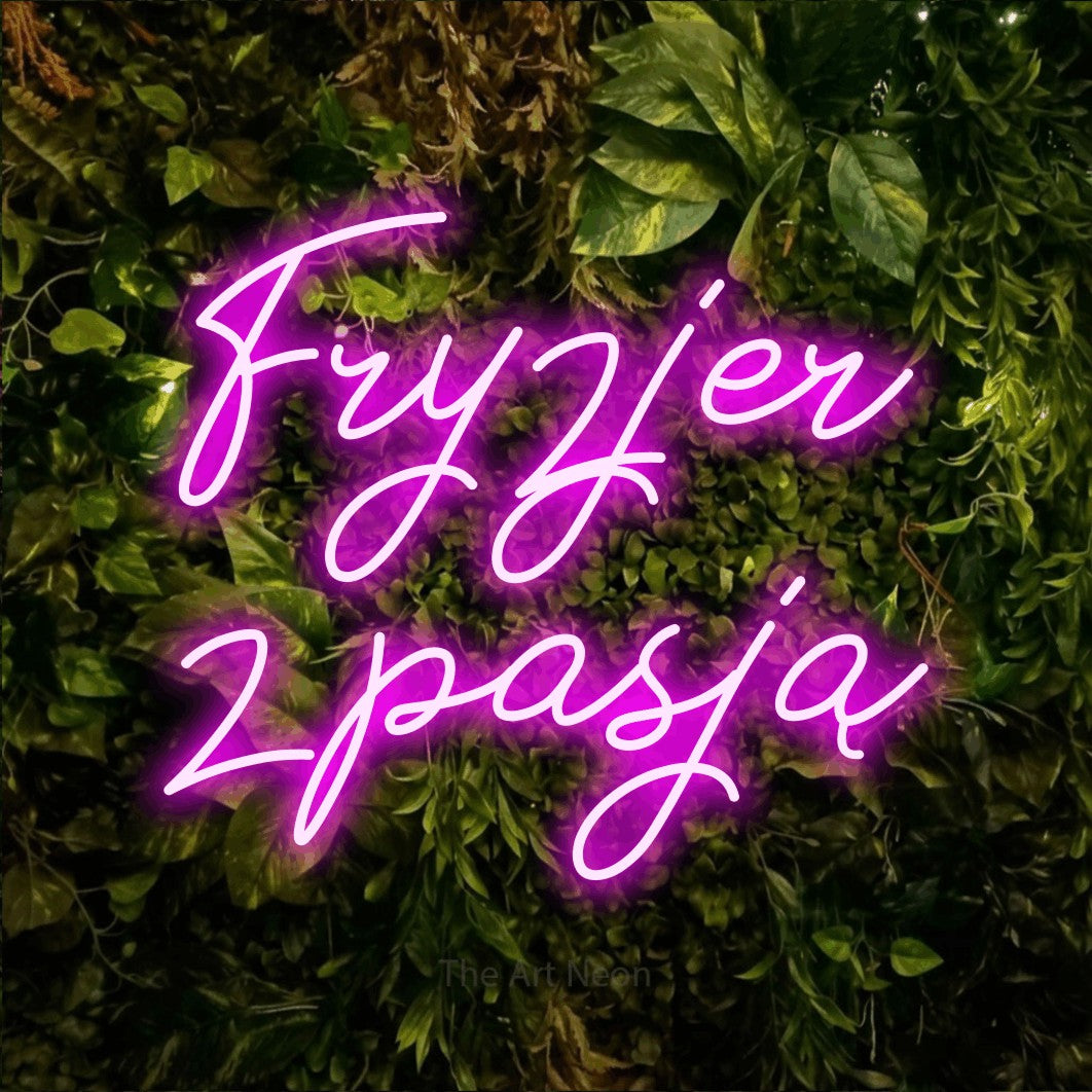 LED neon sign reading “Fryzjer z pasją”, arranged in two lines.