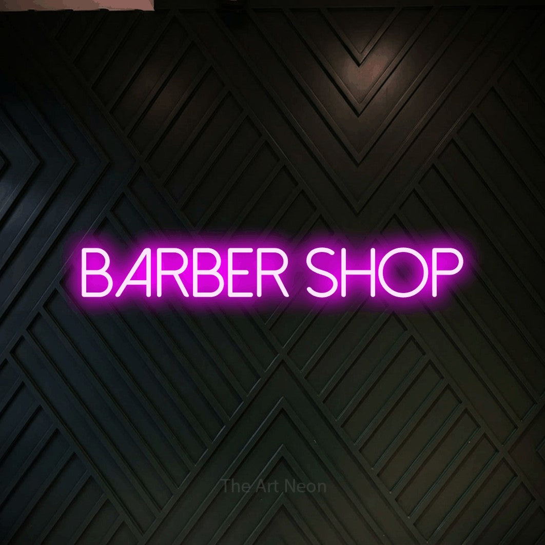 LED neon sign reading “BARBER shop”, arranged in a single line.