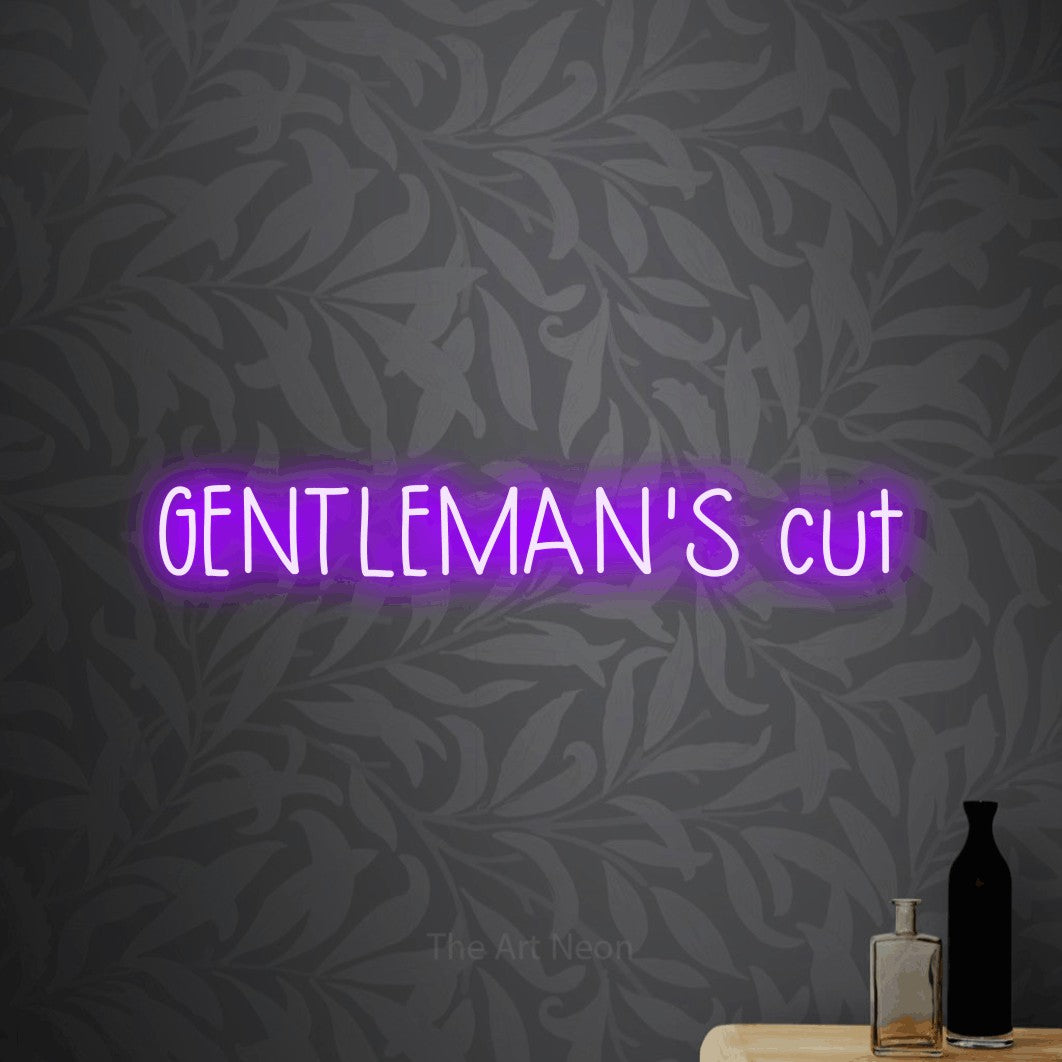 LED neon sign reading “GENTLEMAN'S cut”, arranged in a single line.