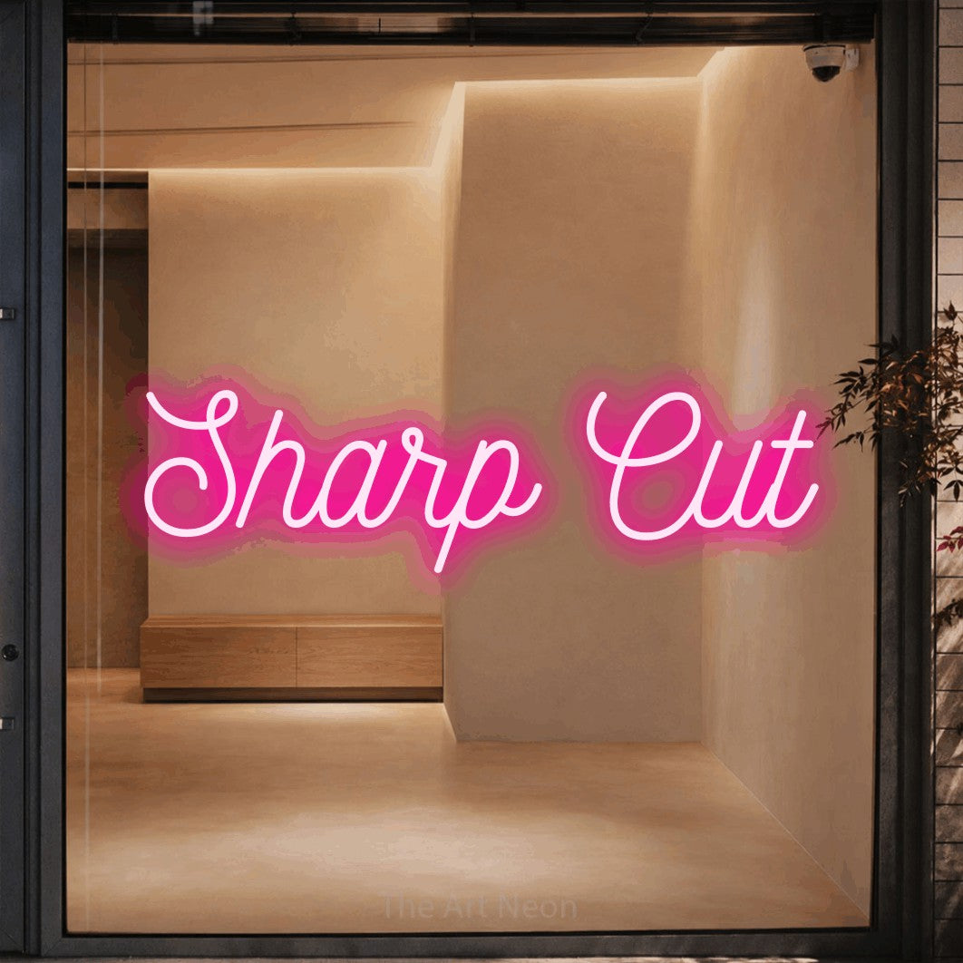 LED neon sign reading “Sharp Cut”, arranged in a single line.