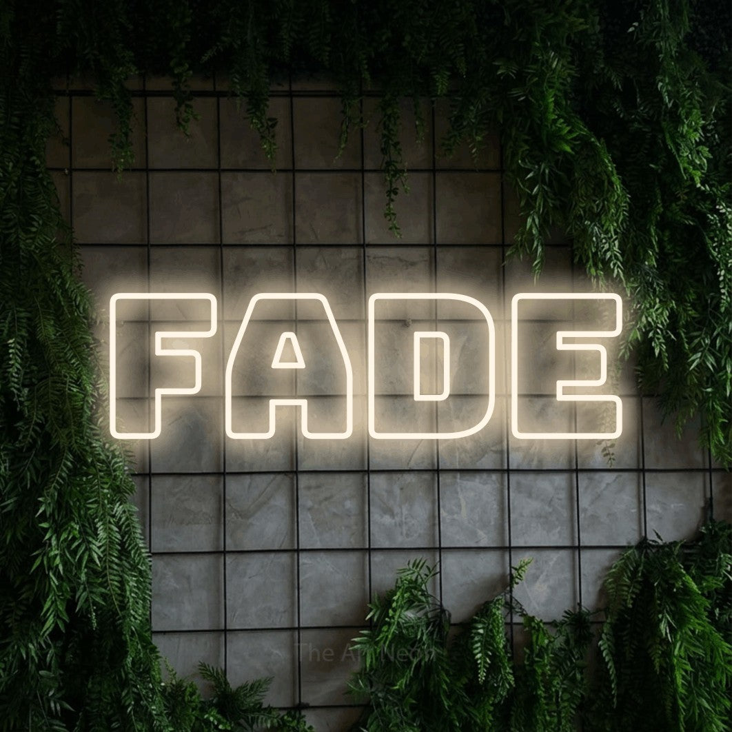 LED neon sign reading “FADE”, arranged in a single line.