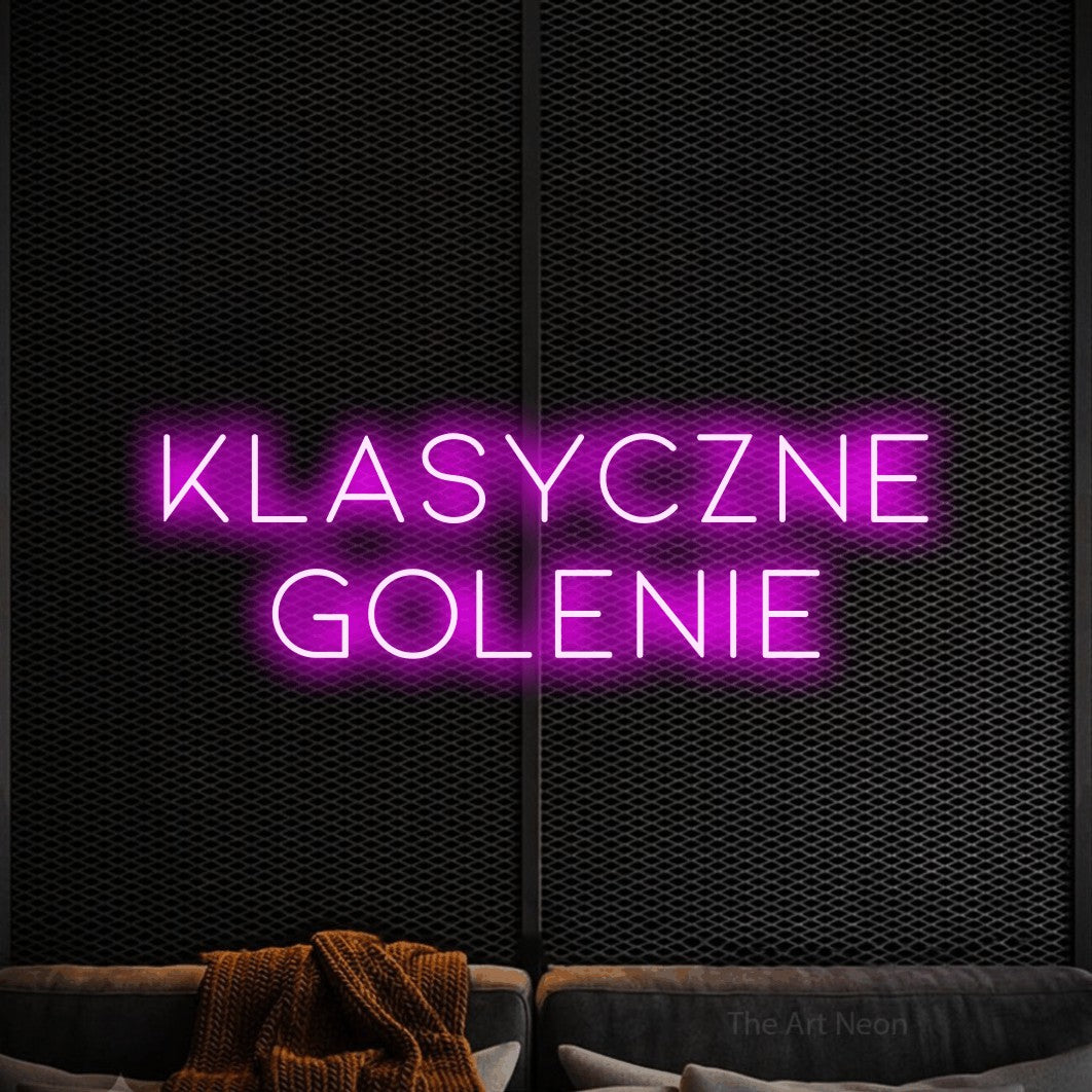 LED neon sign reading “KLASYCZNE golenie”, arranged in two lines.