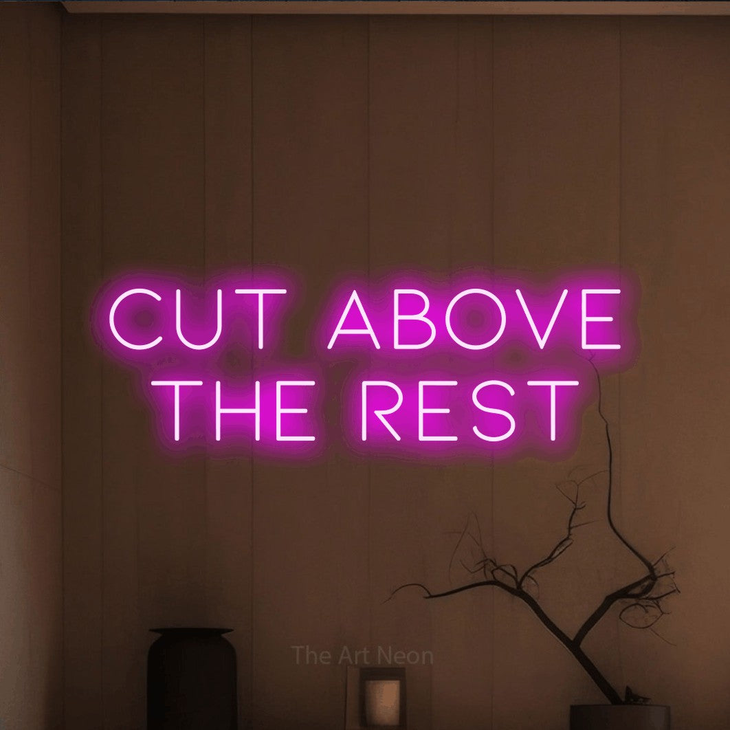 LED neon sign reading “Cut Above the Rest”, arranged in two lines.