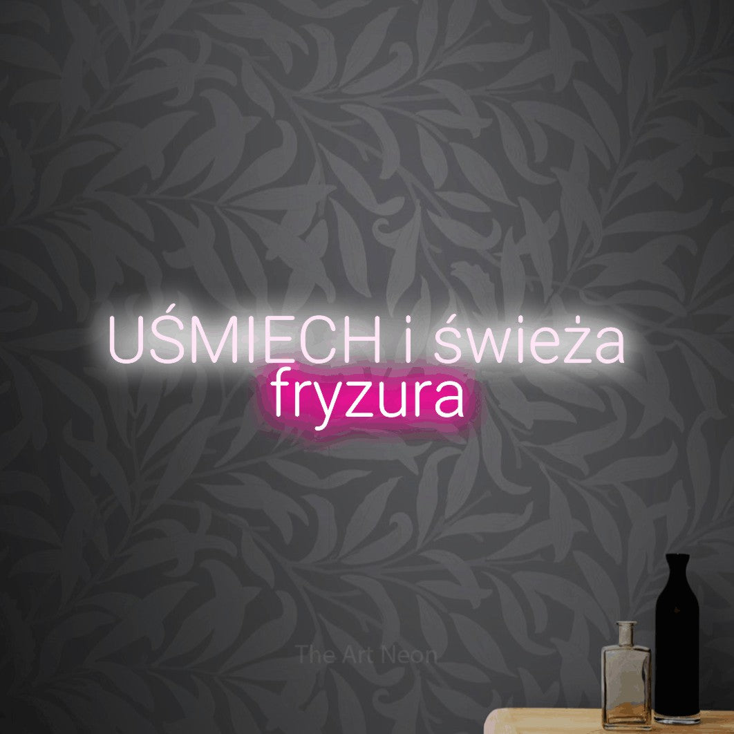 LED neon sign reading “UŚMIECH i świeża fryzura”, arranged in two lines.