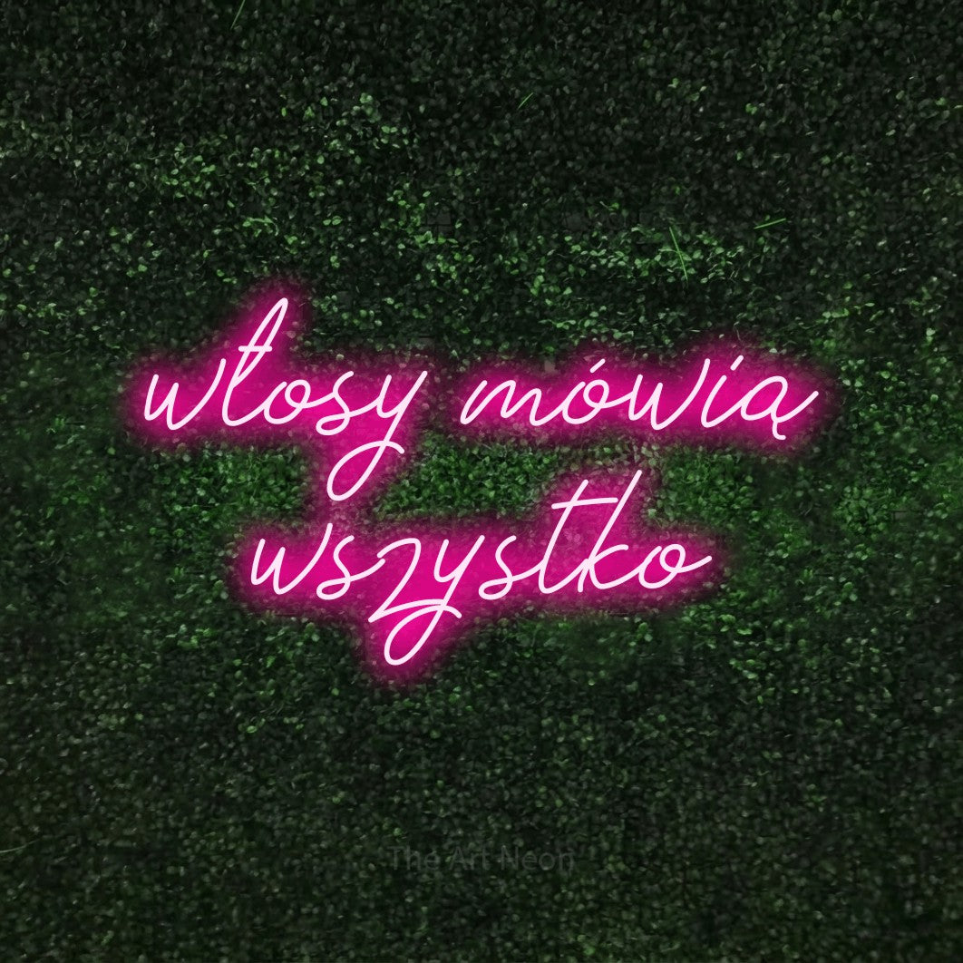 LED neon sign reading “włosy mówią wszystko”, arranged in two lines.