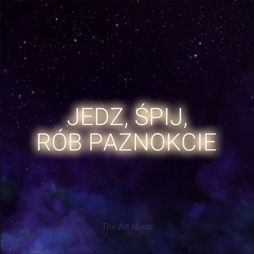 LED neon sign reading “JEDZ, ŚPIJ, RÓB PAZNOKCIE”, arranged in two lines.