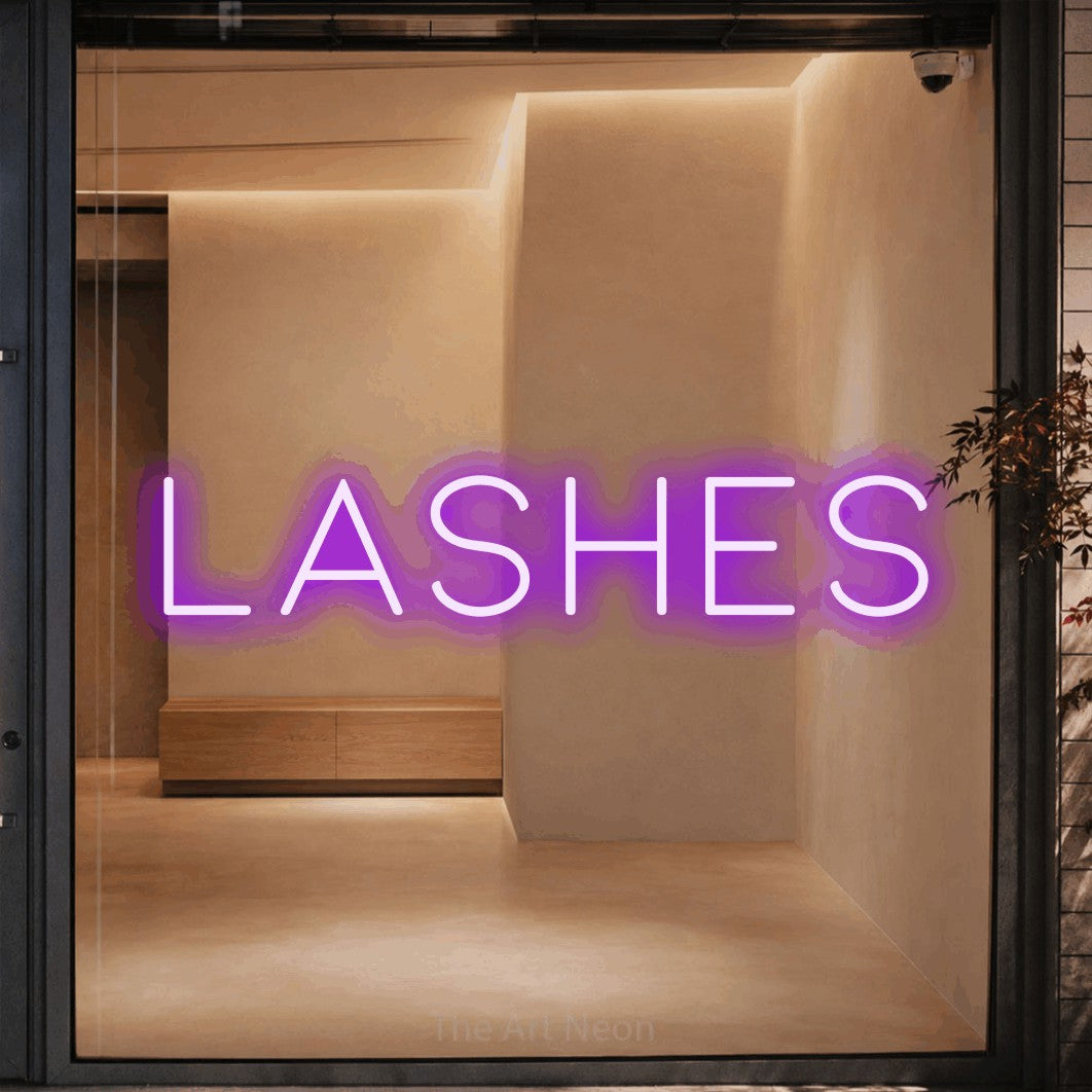 LED neon sign reading “LASHES”, arranged in a single line.