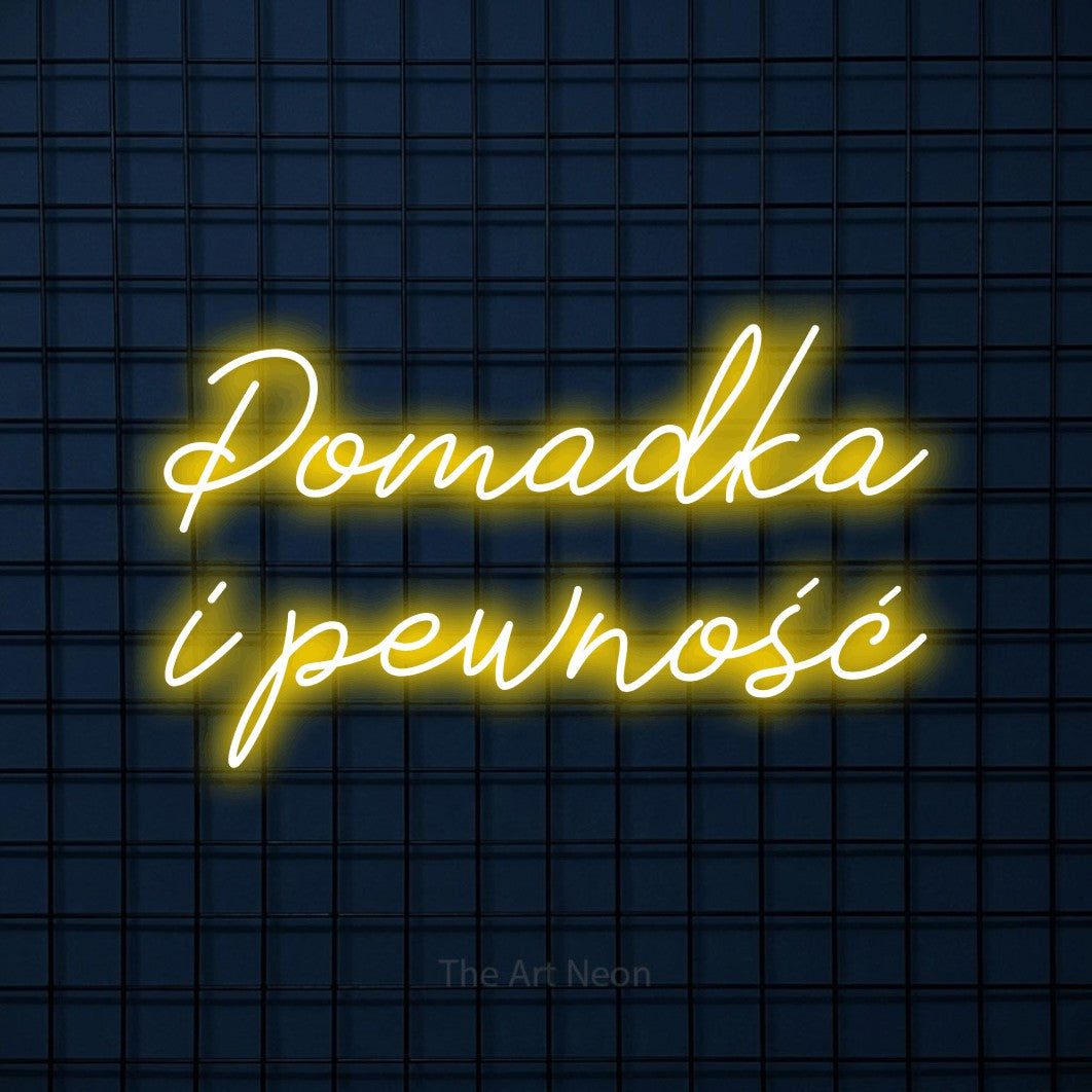 LED neon sign reading “Pomadka i pewność”, arranged in two lines.