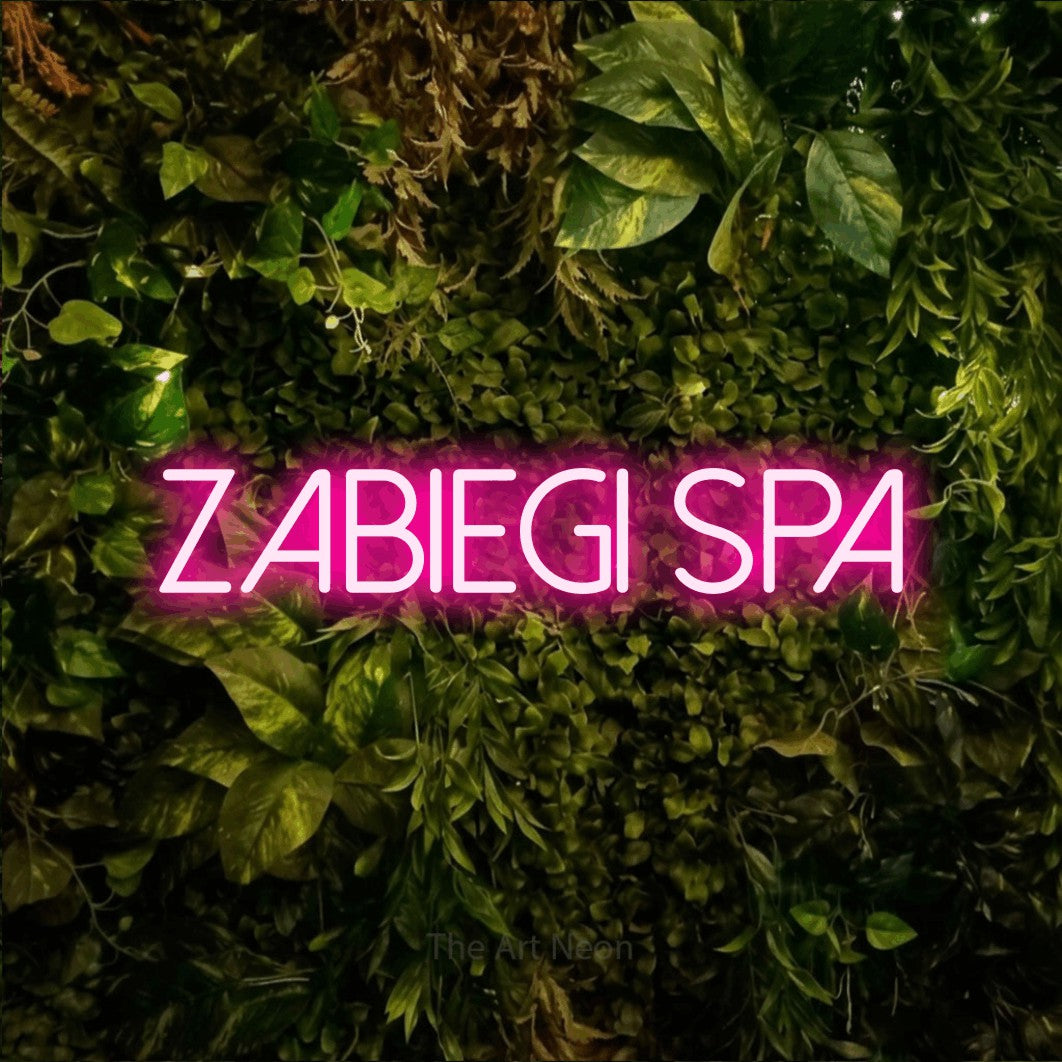 LED neon sign reading “zabiegi spa”, arranged in a single line.