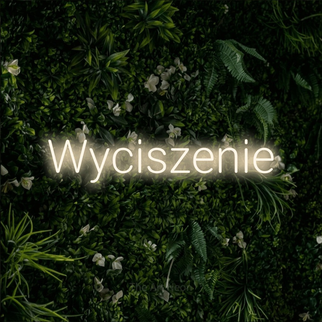 LED neon sign reading “Wyciszenie”, arranged in a single line.