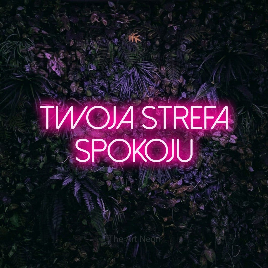 LED neon sign reading “TWOJA STREFA SPOKOJU”, arranged in two lines.