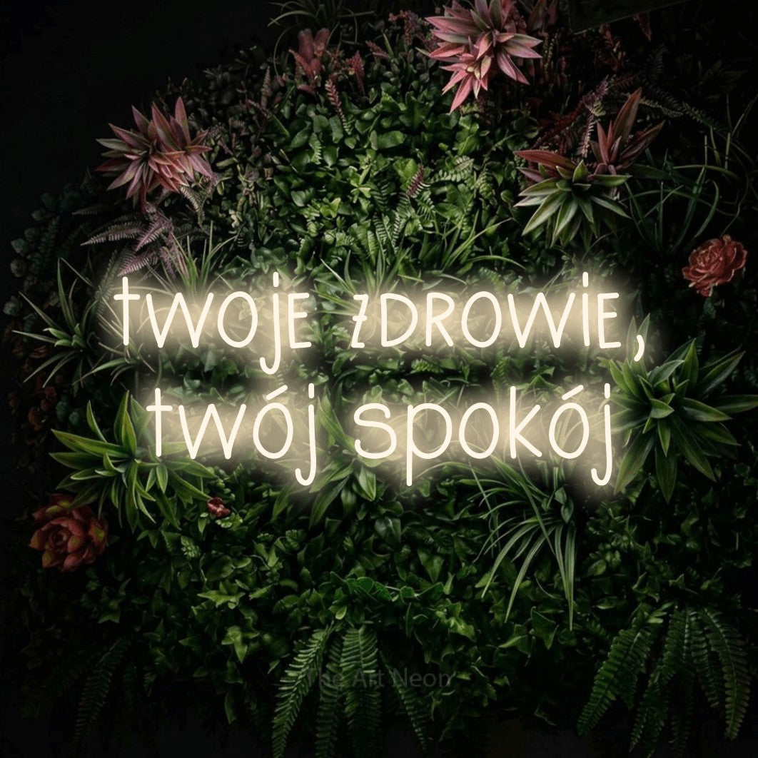 LED neon sign reading “twoje zdrowie, twój spokój”, arranged in two lines.